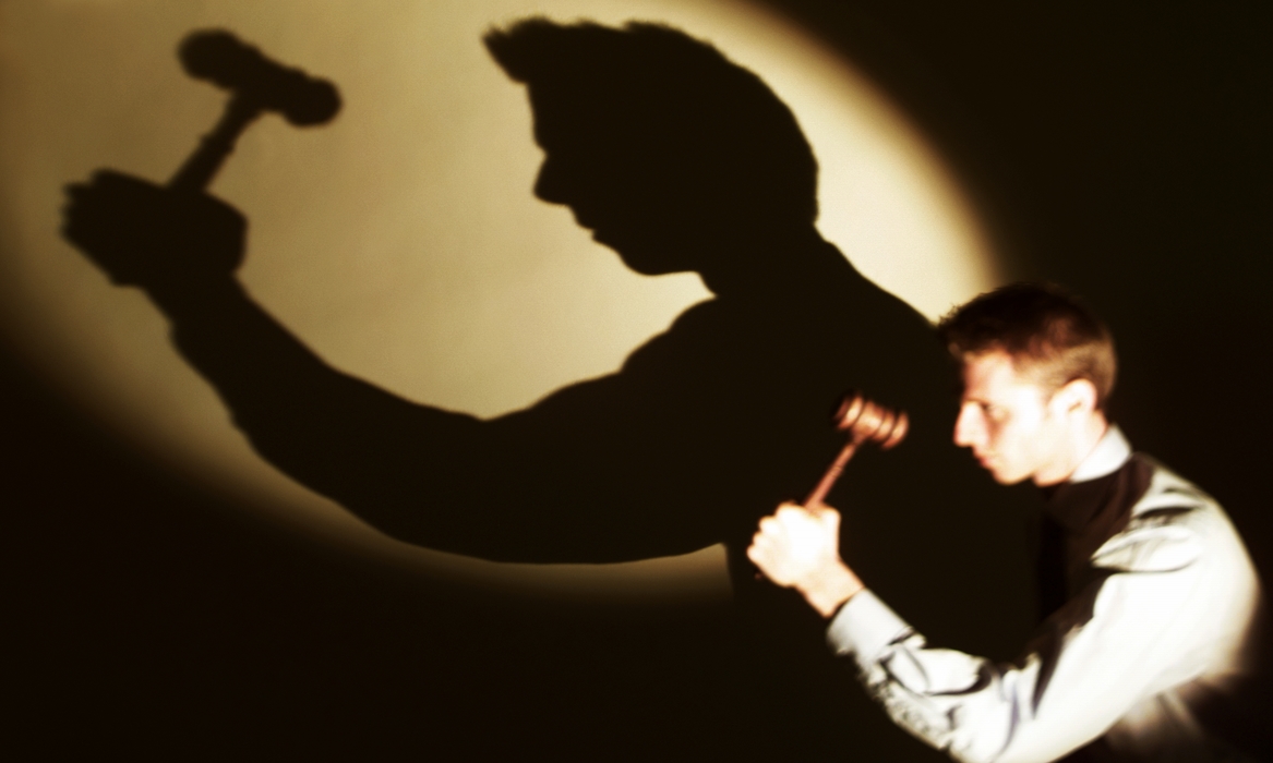Businessman with Judge's Gavel with Shadow