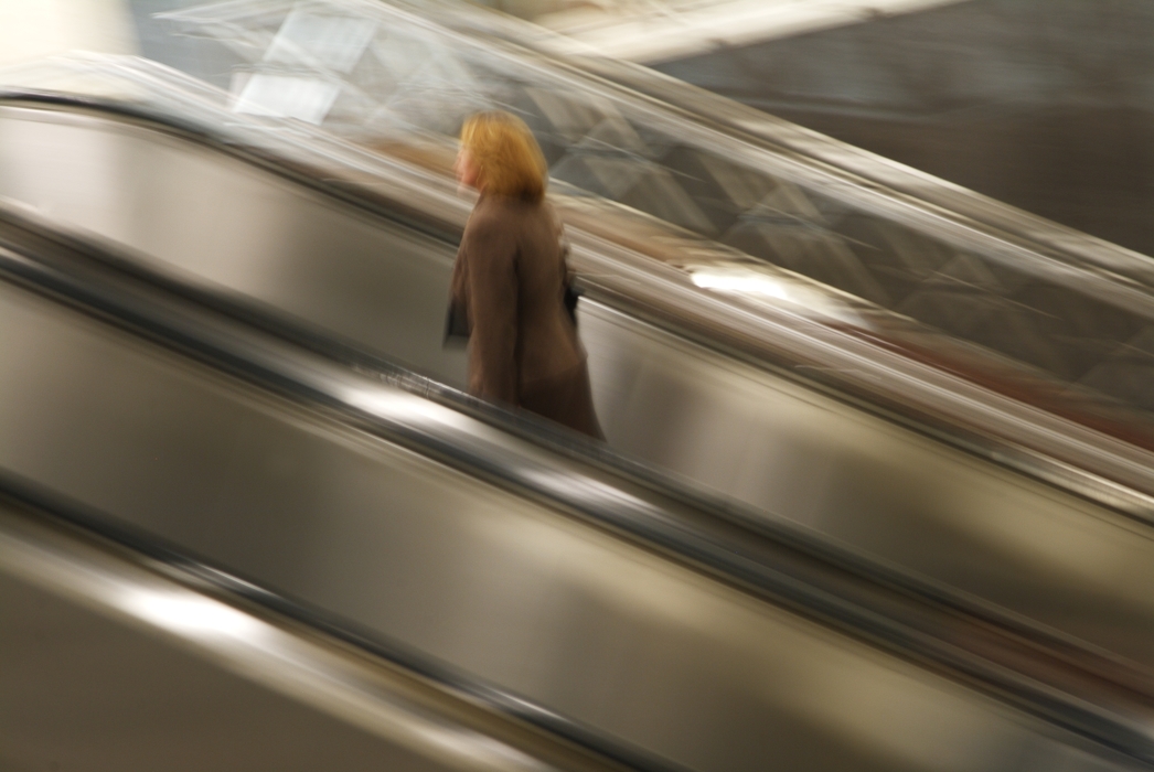 Woman on a Escalator