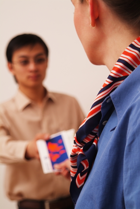 Businessman Receiving Travel Documents