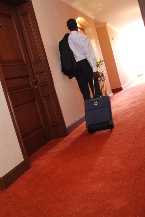 Businessman Leaving Hotel Room