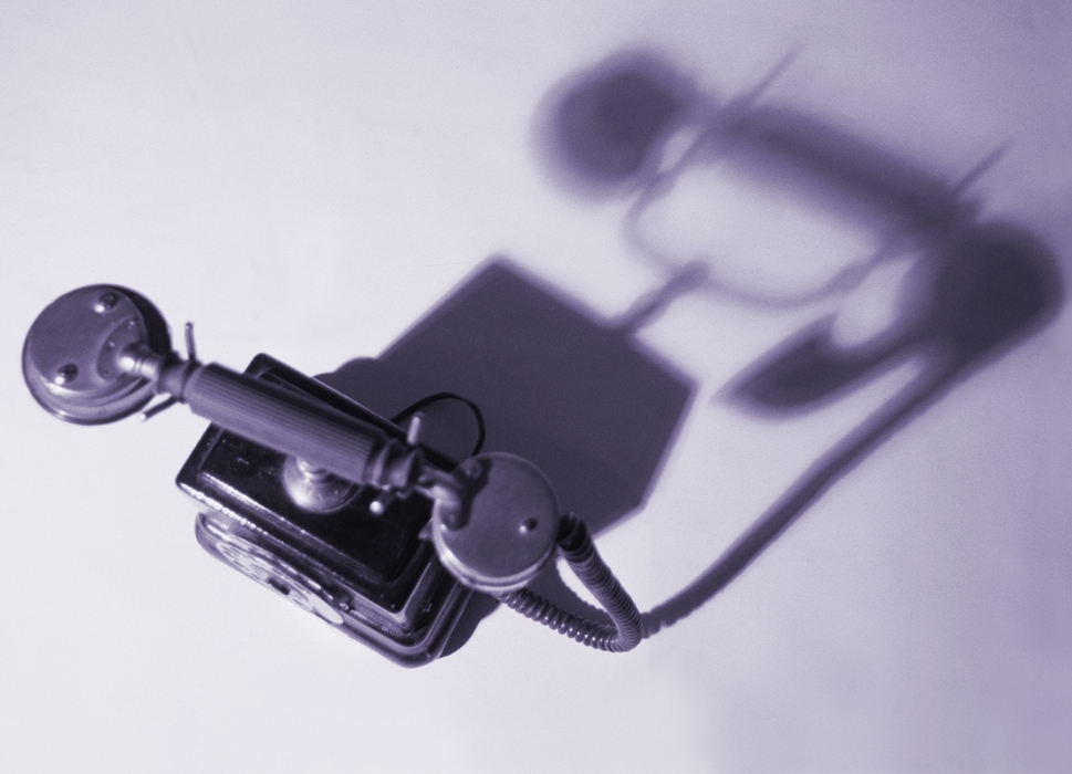 Vintage Telephone with Dramatic Shadow