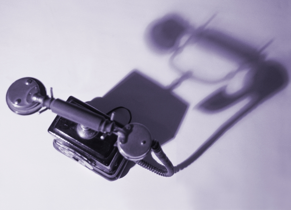 Vintage Telephone with Dramatic Shadow