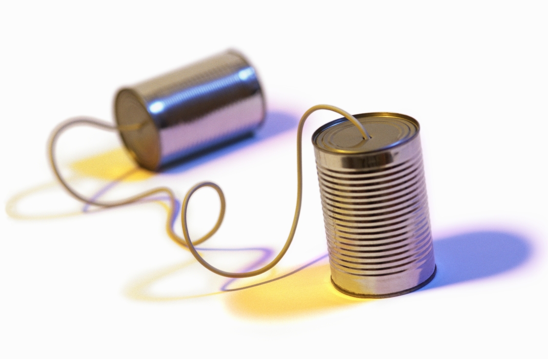 Two Tin Cans Connected with a String