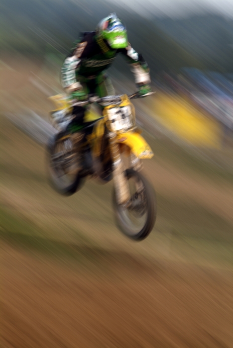 Motocross Racing Single Racer in the Air