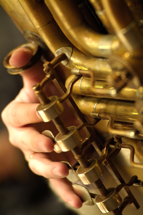 Tuba Player Fingers on Keys