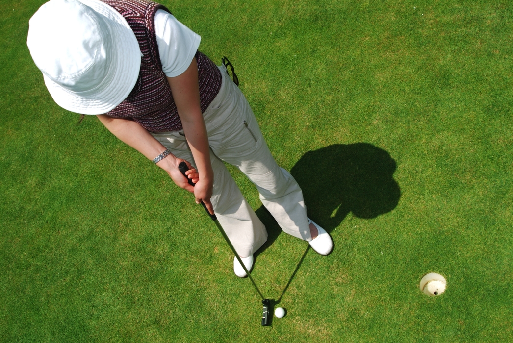 Golfer Making Putt