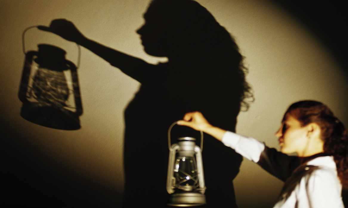 Woman with An Oil Lamp with Shadow