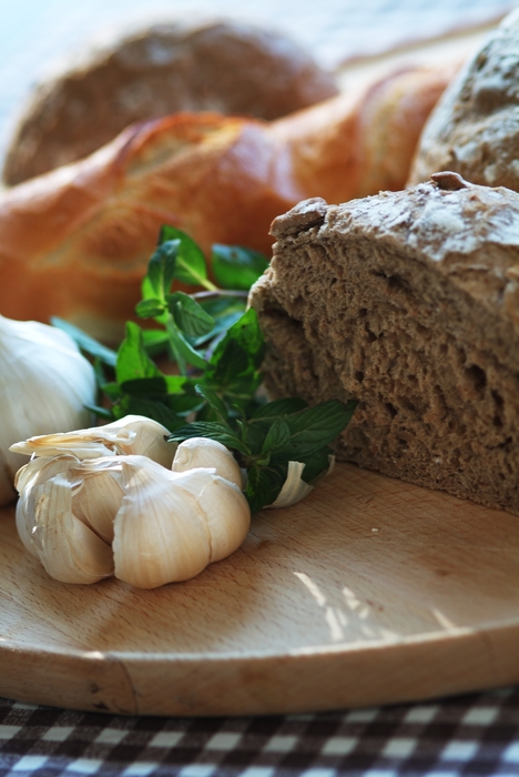 Garlic Cloves and Assorted Breads