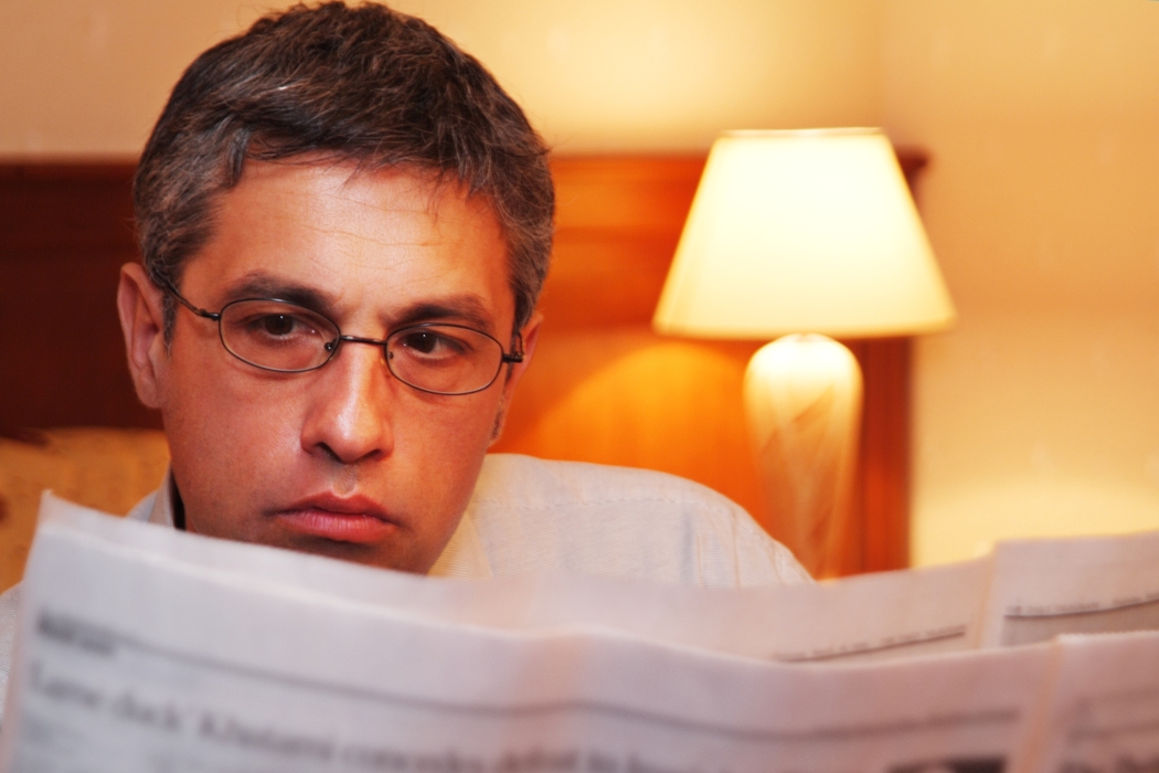 Businessman Reading Newspaper