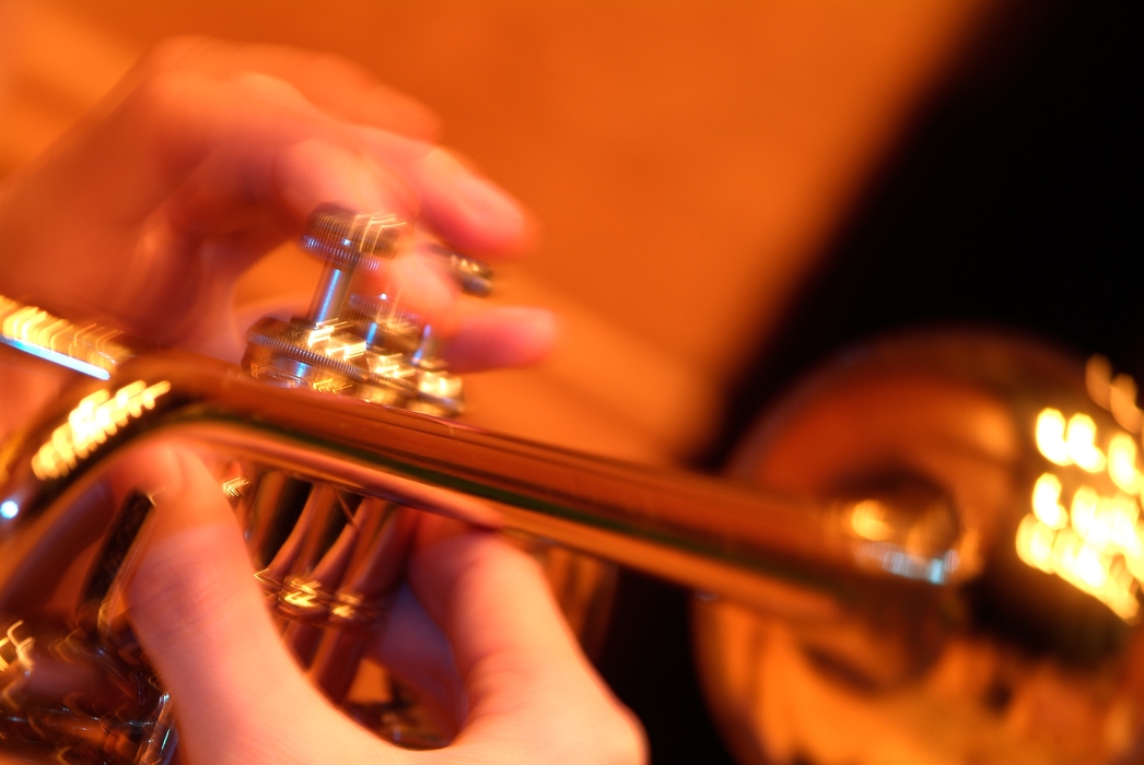 Orchestral Trumpeter Fingers on Buttons