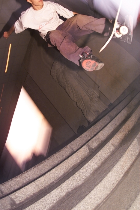 Skateboarder Jumps down Stairs