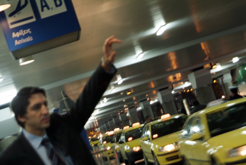 Businessman Hailing a Cab