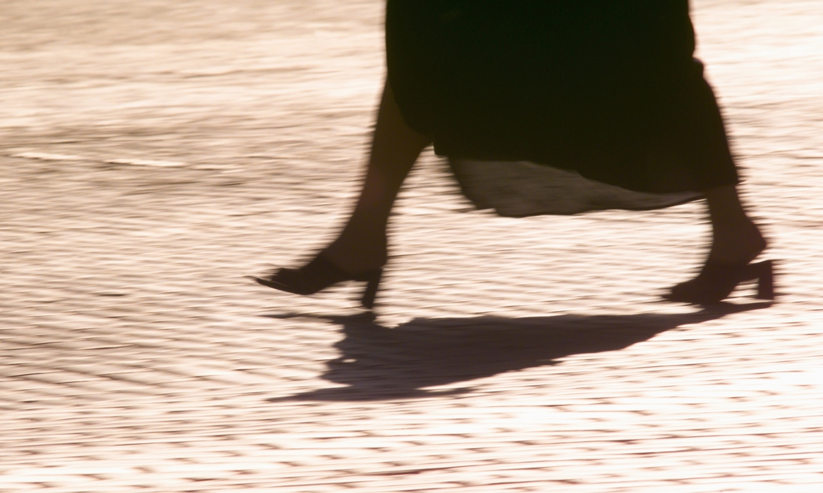 On The Move Woman Walking Briskly
