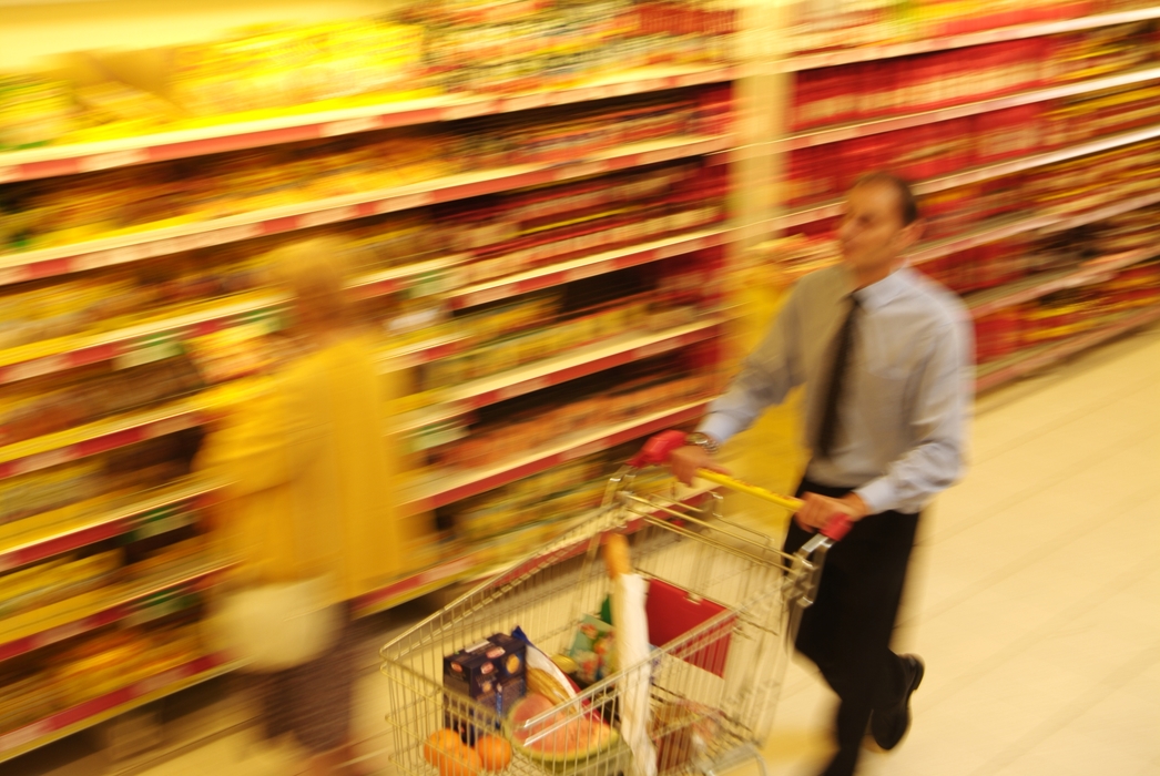 Shopping with Grocery Cart at Supermarket