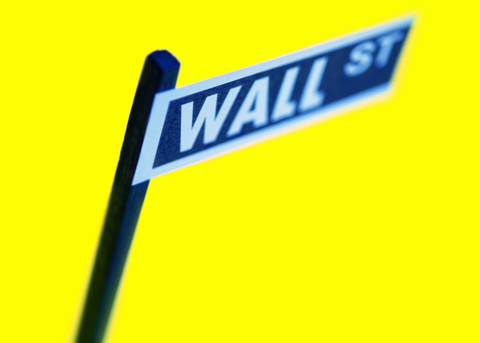 Street Sign Reading "Wall St"