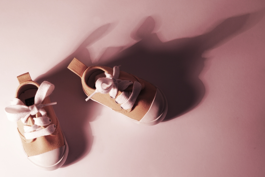 Baby Shoes with Dramatic Shadow