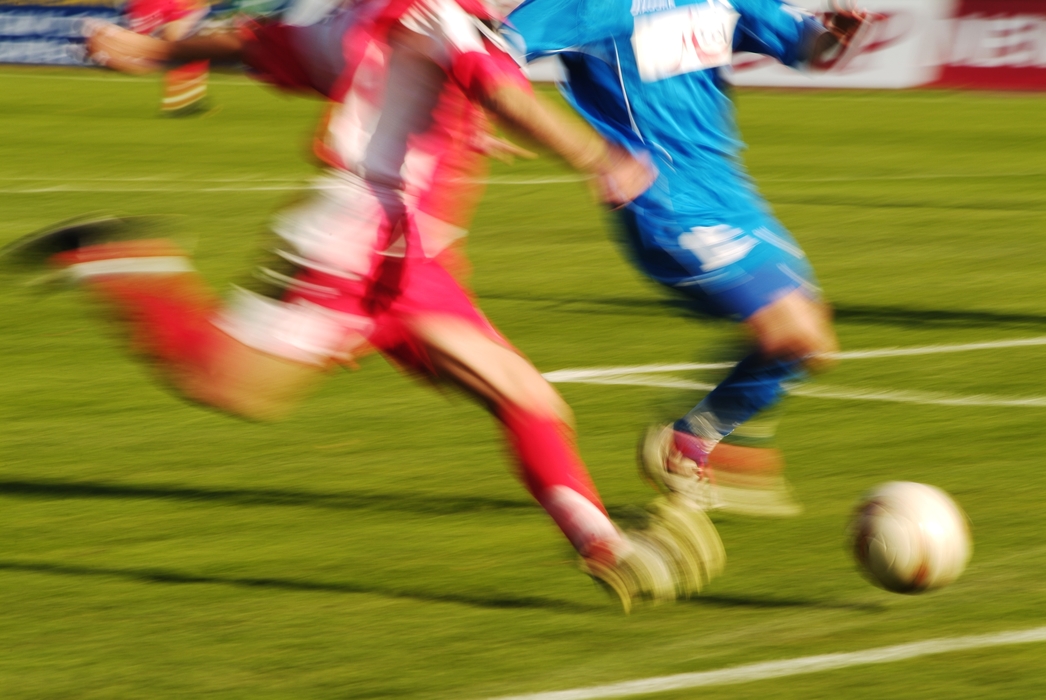European Football: Soccer Players Advance the Ball