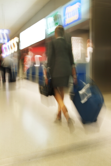 Businesswoman Walking with Her Luggage