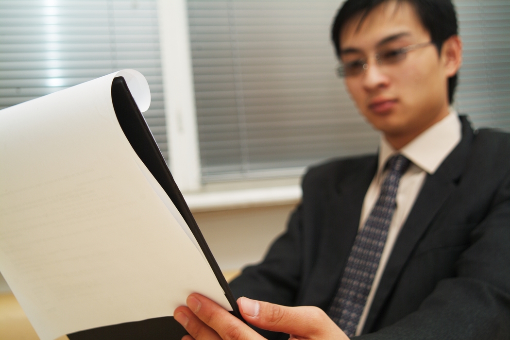 Businessman Reviewing Documents