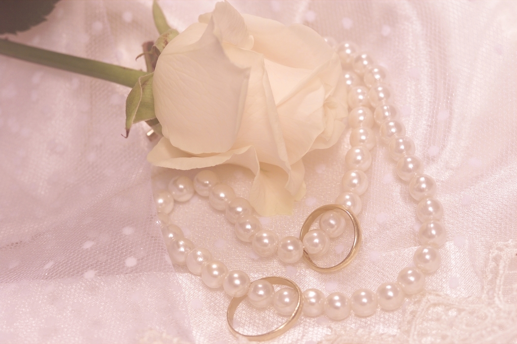 The Wedding Day:  Wedding Rings with White Rose and Pearls
