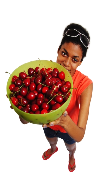 Woman Holding Bowl of Cherries