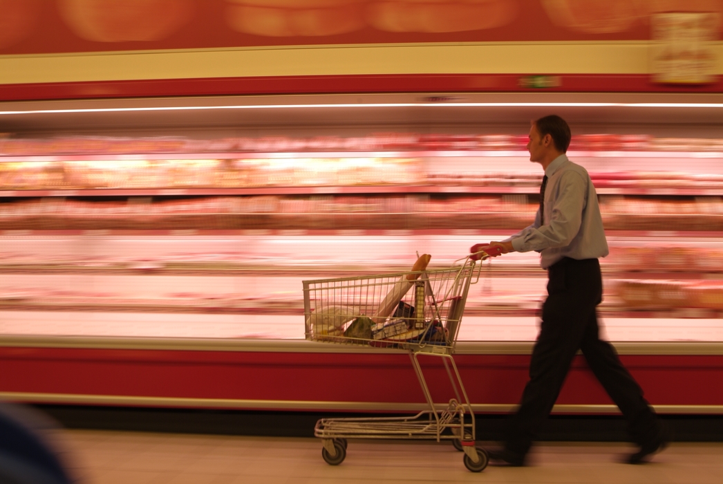 Shopping with Grocery Cart at Supermarket