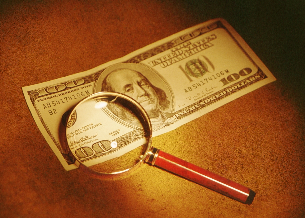 $ Bill Under a Magnifying Glass