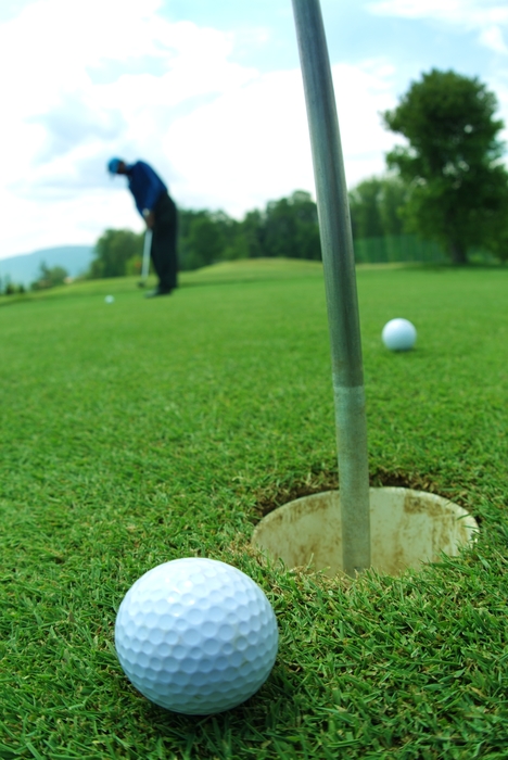 Golfer Practicing Putting