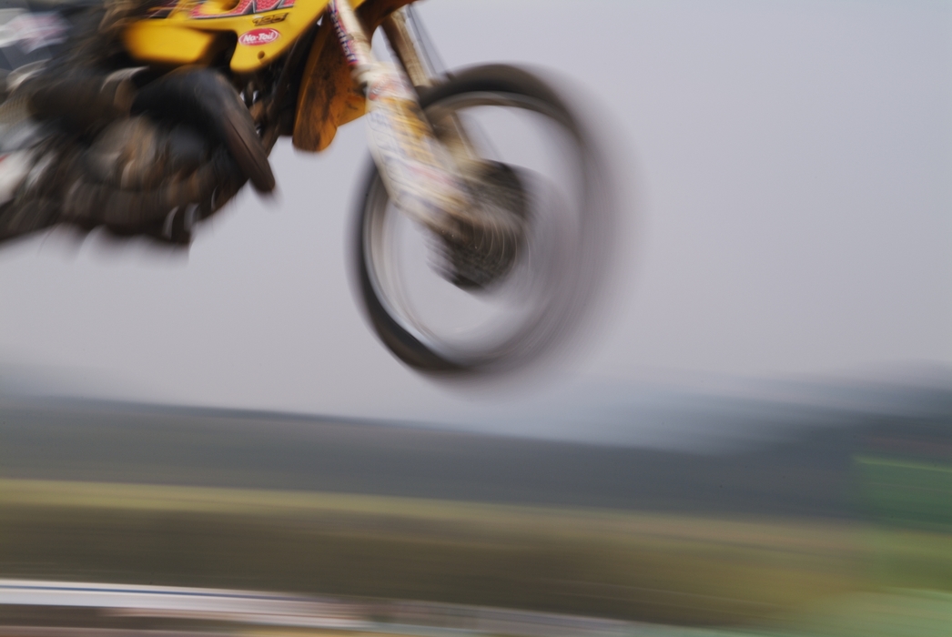 Motocross Racing Flies Through the Air