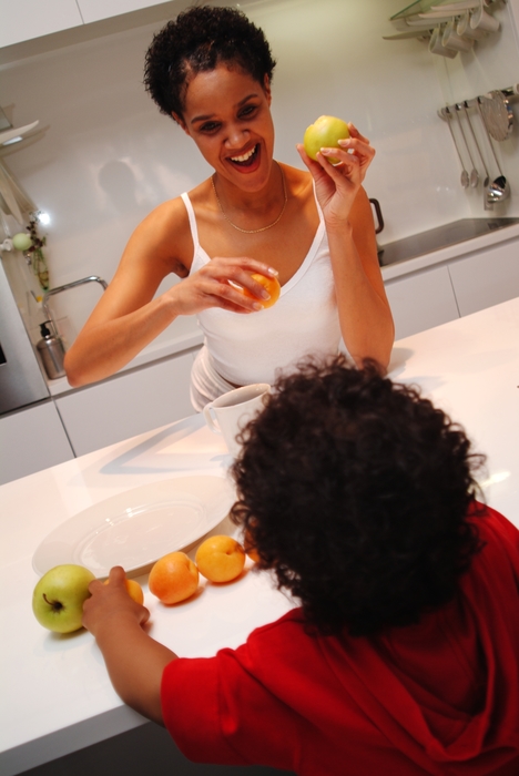 Mother and Son Having Breakfast