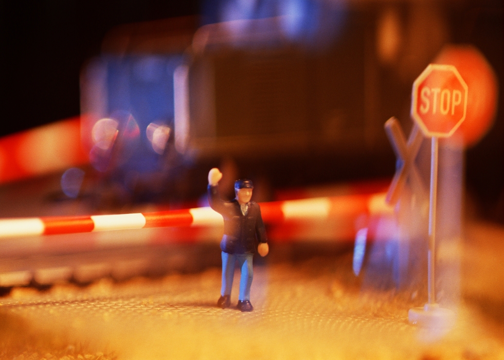 Toy Person At The Railroad Crossing