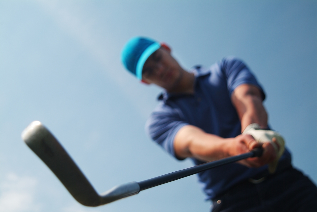 Golfer Lining Up Shot