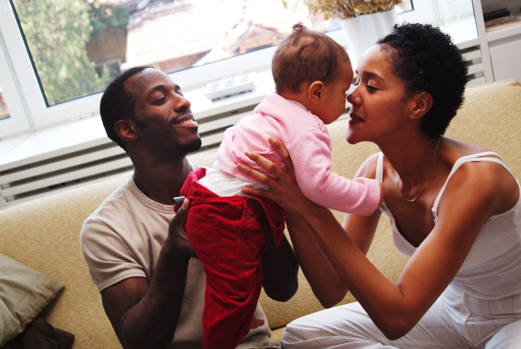 Family Playing At Home