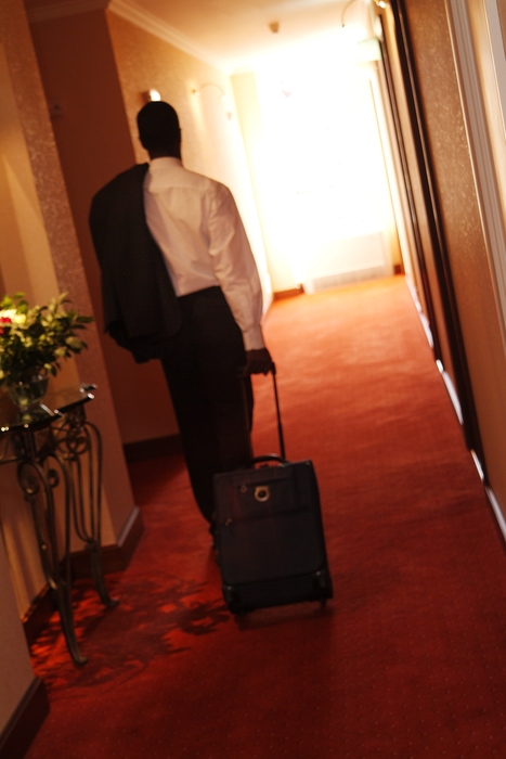 Businessman Leaving Hotel Room