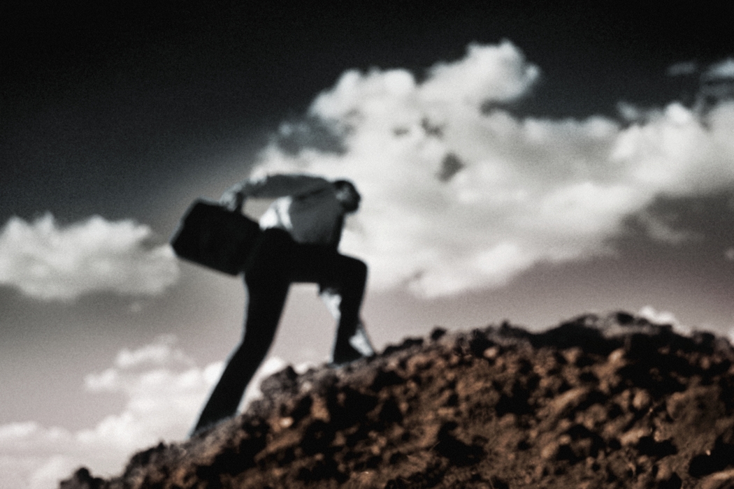 Businessman Climbing Hill (Sample Image)