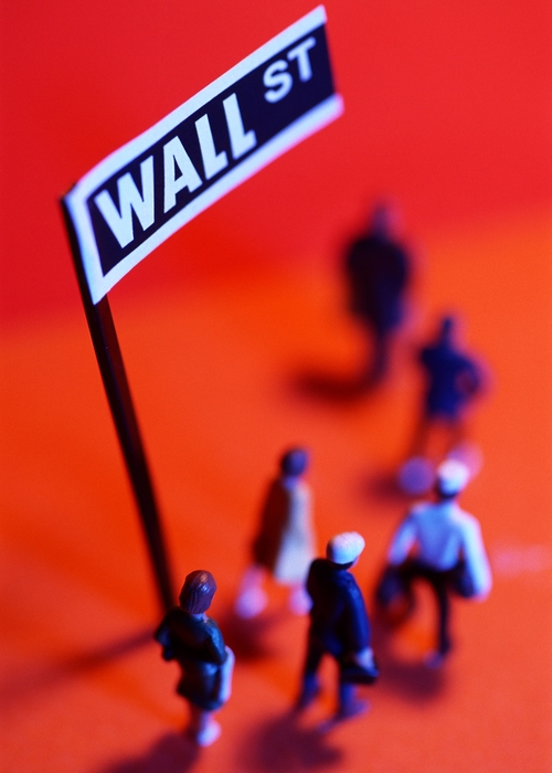 Toy People At "Wall Street" Sign