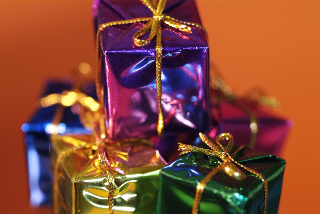 Shiny Christmas Presents with Gold Ribbons