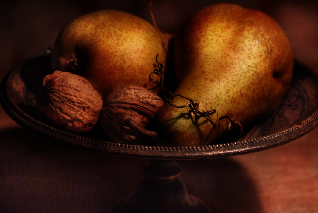 Ripe Bosc Pears in a Fruit Bowl with Walnuts
