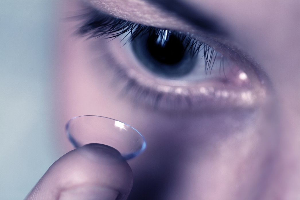 Woman Putting in Contact Lenses