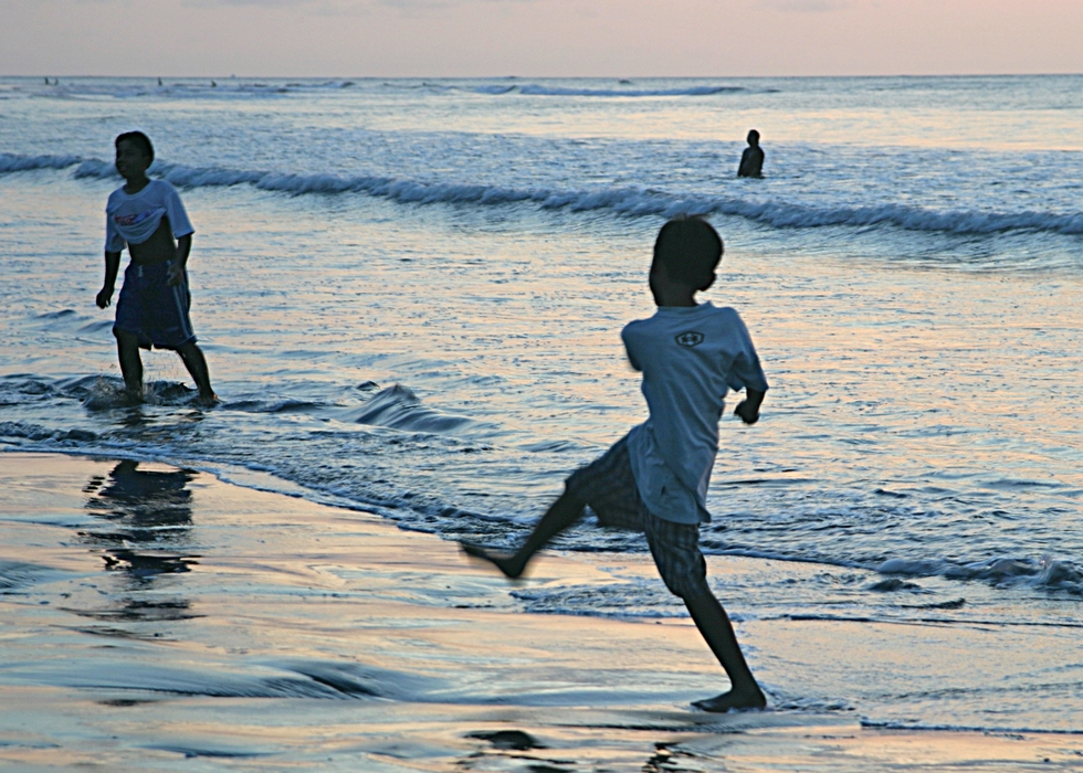 Playing on the Beach, Bali, Indonesia